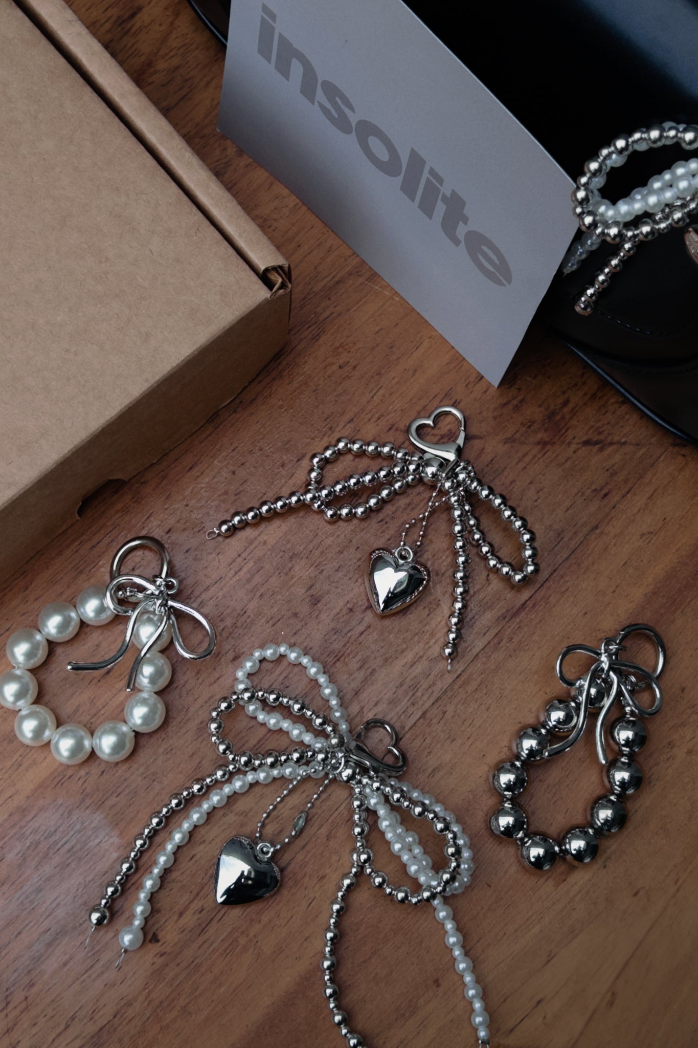 BAG CHARM - LAÇO